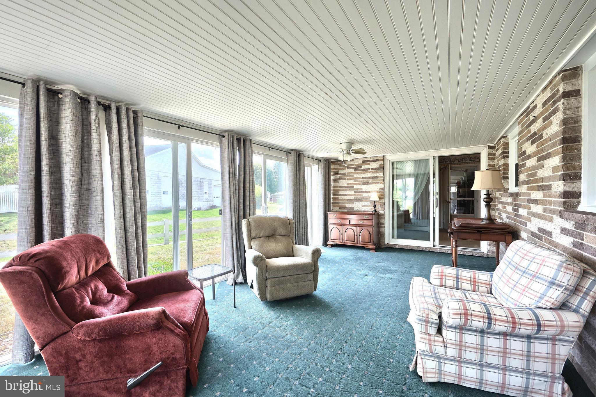 181 Harrisburg Street York Springs, PA 17372 - Photo 27 of 44 a living room with furniture and a large window