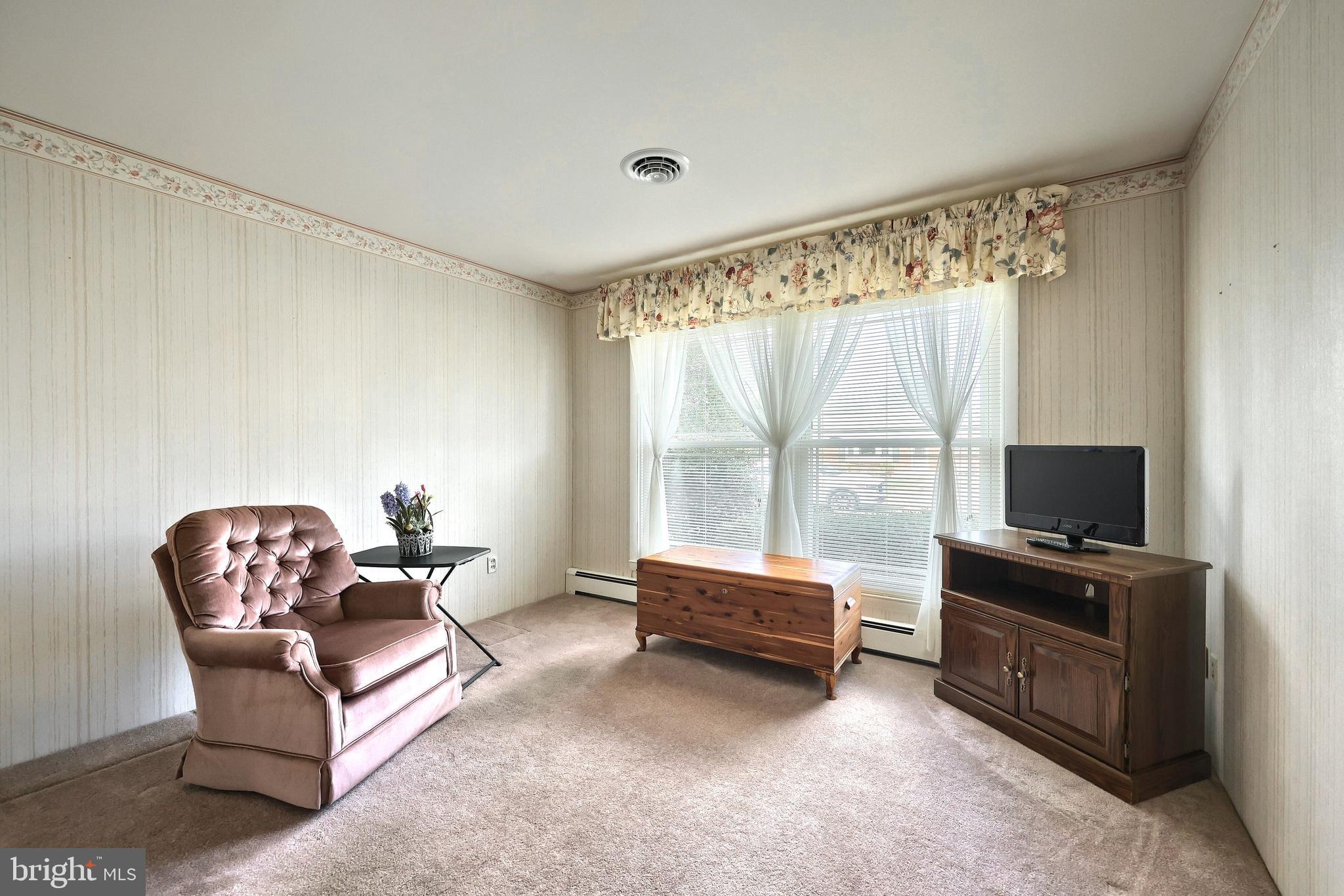 181 Harrisburg Street York Springs, PA 17372 - Photo 28 of 44 a living room with furniture and a flat screen tv