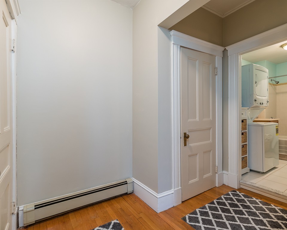 21 Thorndike Street, Unit 4 Beverly, MA 01915 - Photo 13 of 20 a view of a room with wooden floor and small space