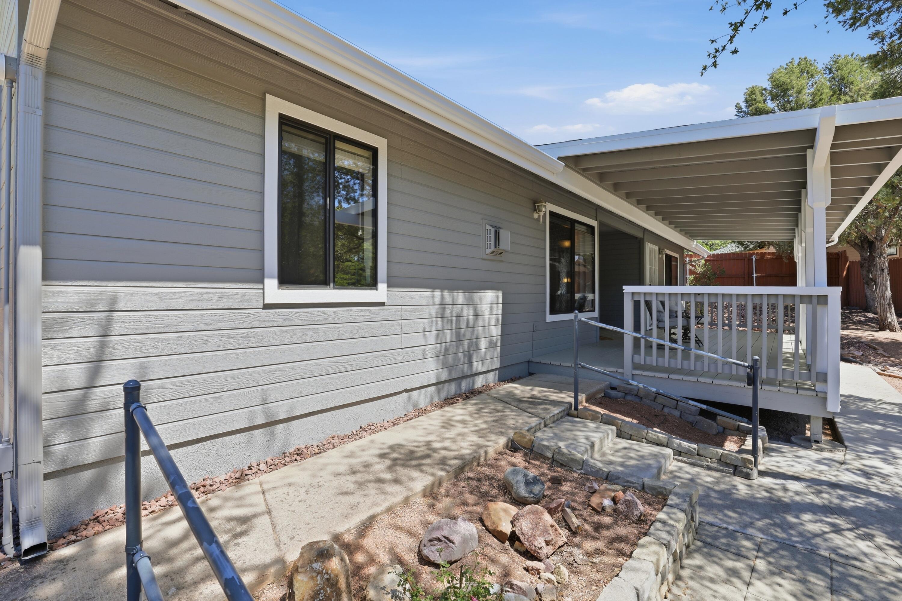 910 West Wagon Trail Payson, AZ 85541 - Photo 23 of 35 a view of a house with wooden deck and furniture