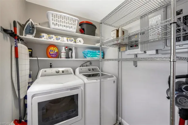 an aerial view of a house and outdoor space