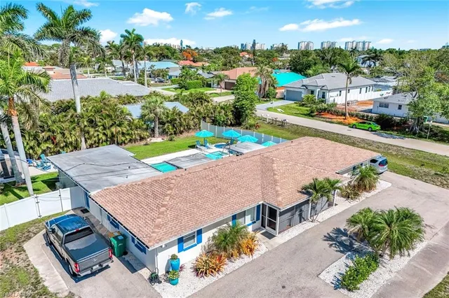 a front view of house with green space