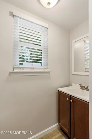 a bathroom with a sink and a vanity