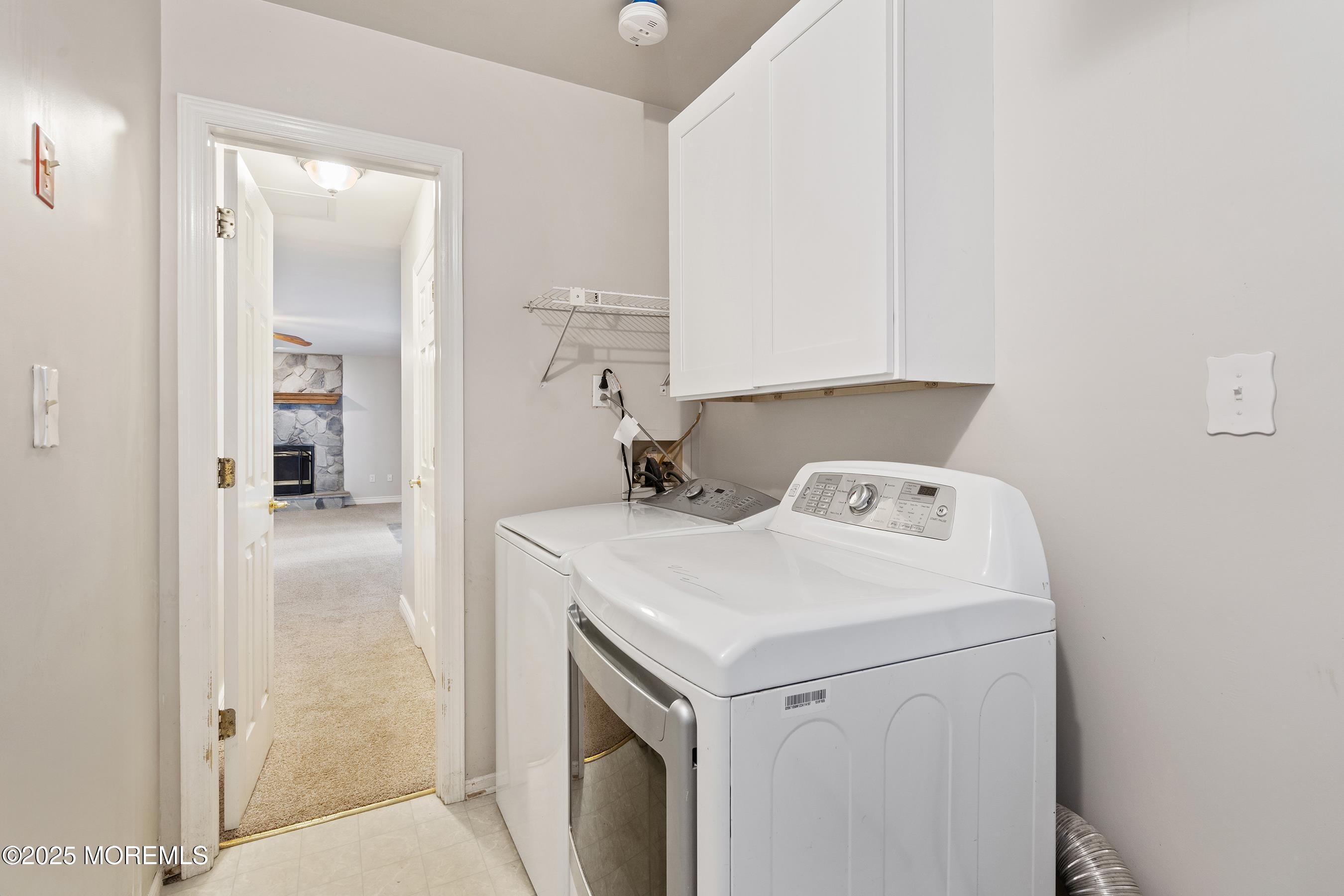 122 Moses Milch Drive Howell, NJ 07731 - Photo 12 of 15 a utility room with dryer and washer
