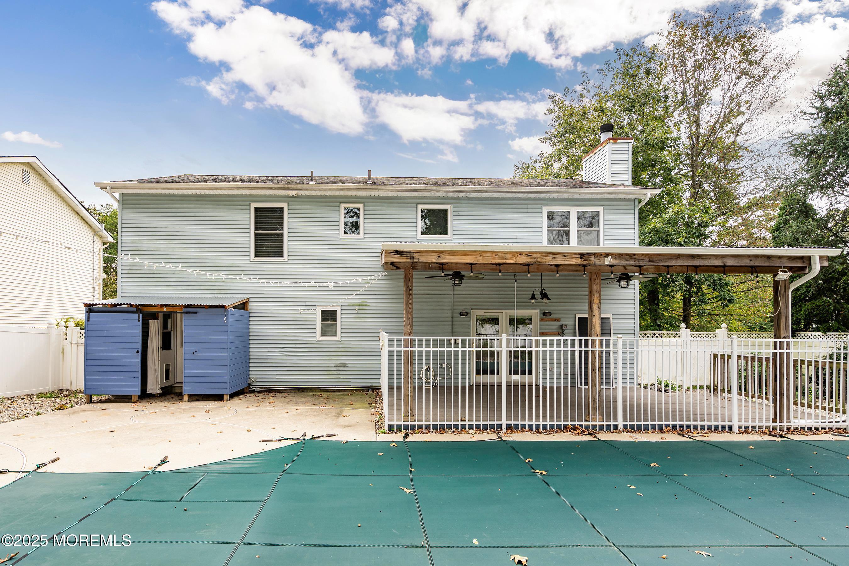 122 Moses Milch Drive Howell, NJ 07731 - Photo 15 of 15 a view of a house with a backyard and a large tree