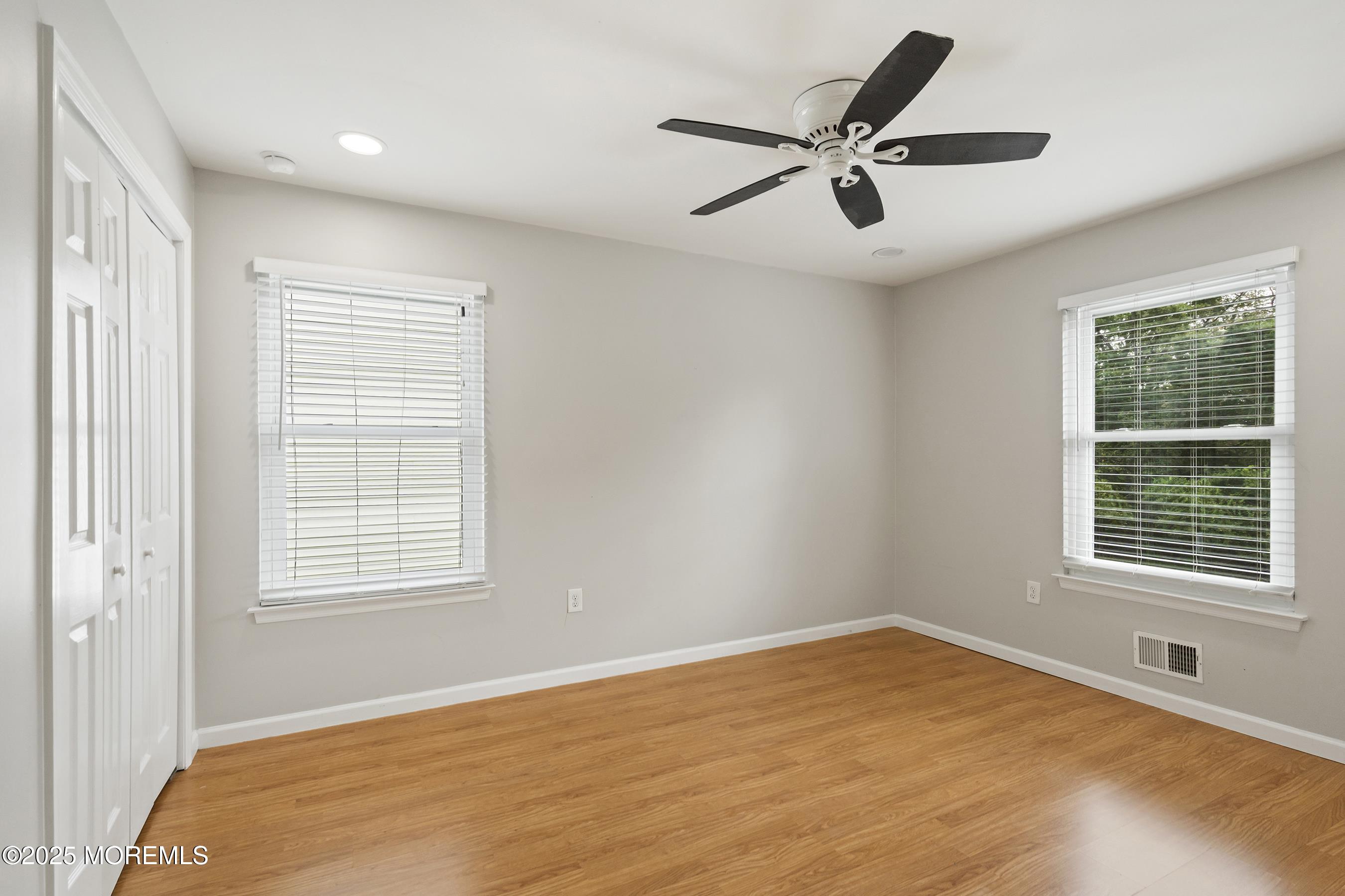 122 Moses Milch Drive Howell, NJ 07731 - Photo 7 of 15 a view of an empty room with a window