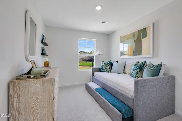 a bed room with a bed and a couch