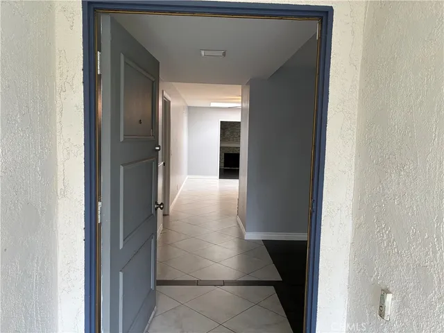 a kitchen with sink and cabinets