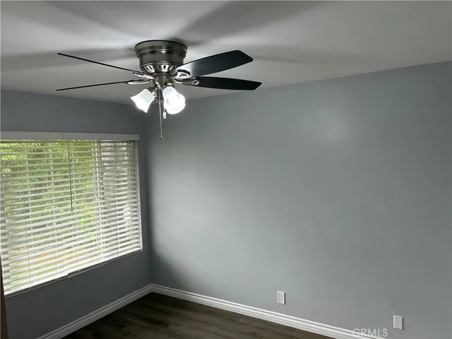 a view of a backyard with a garden and plants