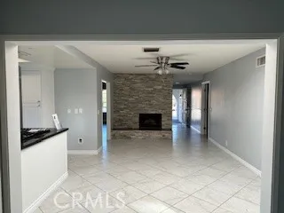 a kitchen with stainless steel appliances a sink a stove a refrigerator and cabinets