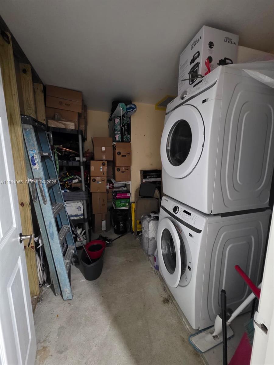 13370 Southwest 261st Terrace Homestead, FL 33032 - Photo 14 of 35 a utility room with dryer washer and other items