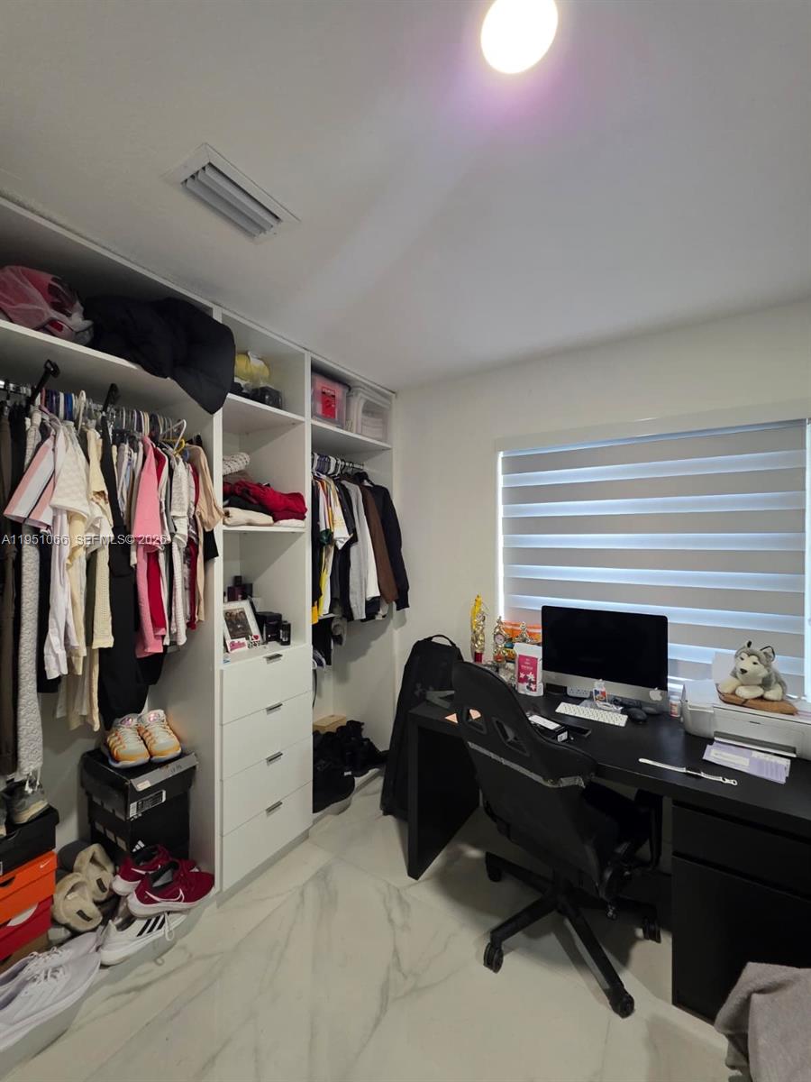 13370 Southwest 261st Terrace Homestead, FL 33032 - Photo 21 of 35 a view of a workspace with furniture