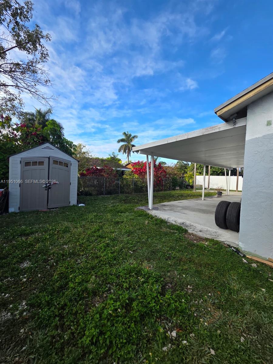 13370 Southwest 261st Terrace Homestead, FL 33032 - Photo 32 of 35 a view of a back yard
