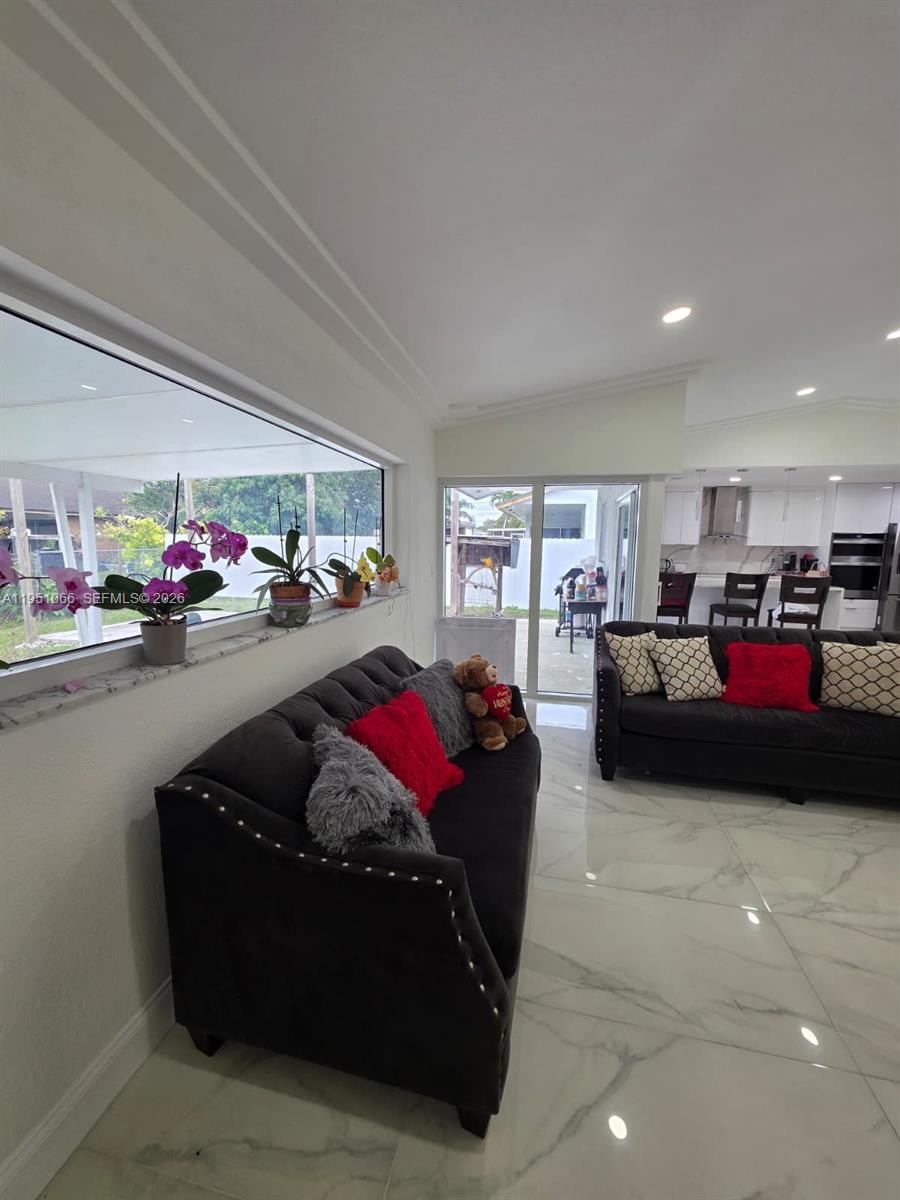 13370 Southwest 261st Terrace Homestead, FL 33032 - Photo 8 of 35 a living room with furniture and a couch