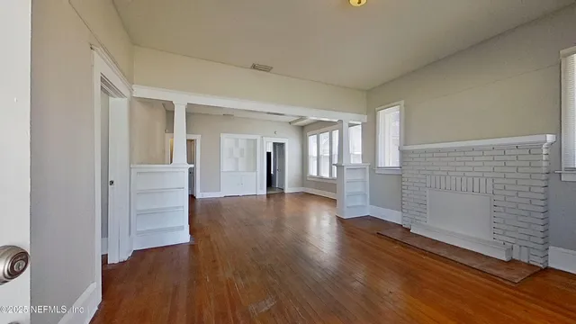 a view of entryway with wooden floor