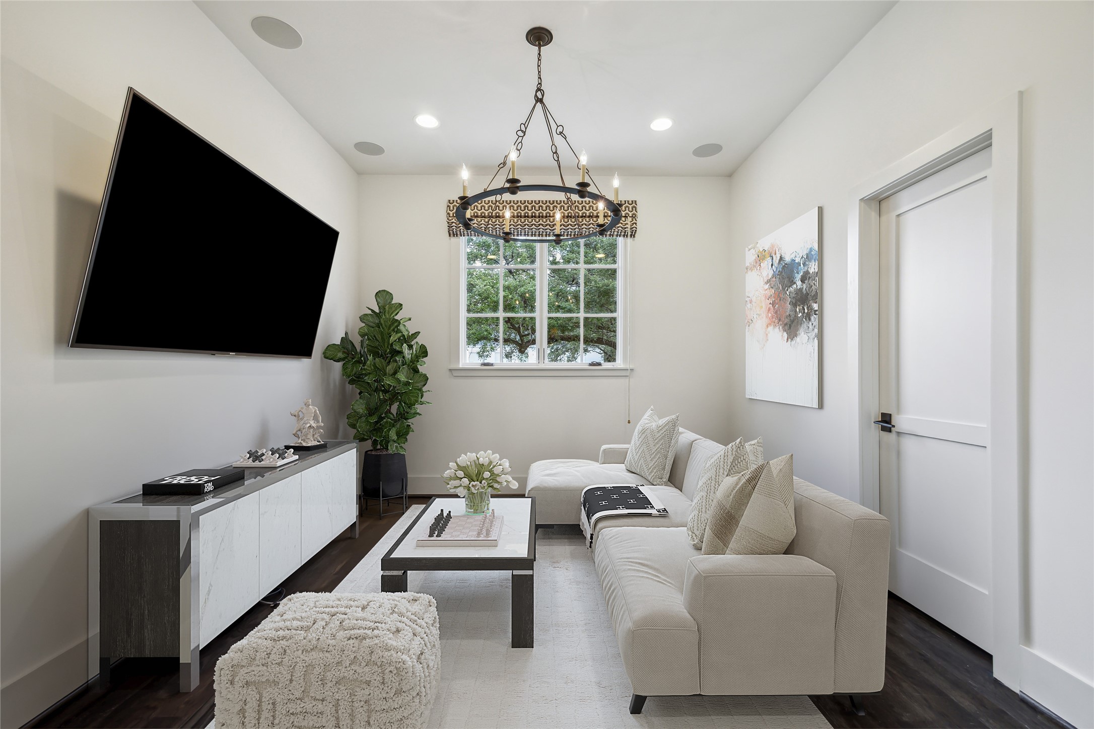 3214 Westheimer Road Houston, TX 77098 - Photo 23 of 34 a living room with furniture and a flat screen tv