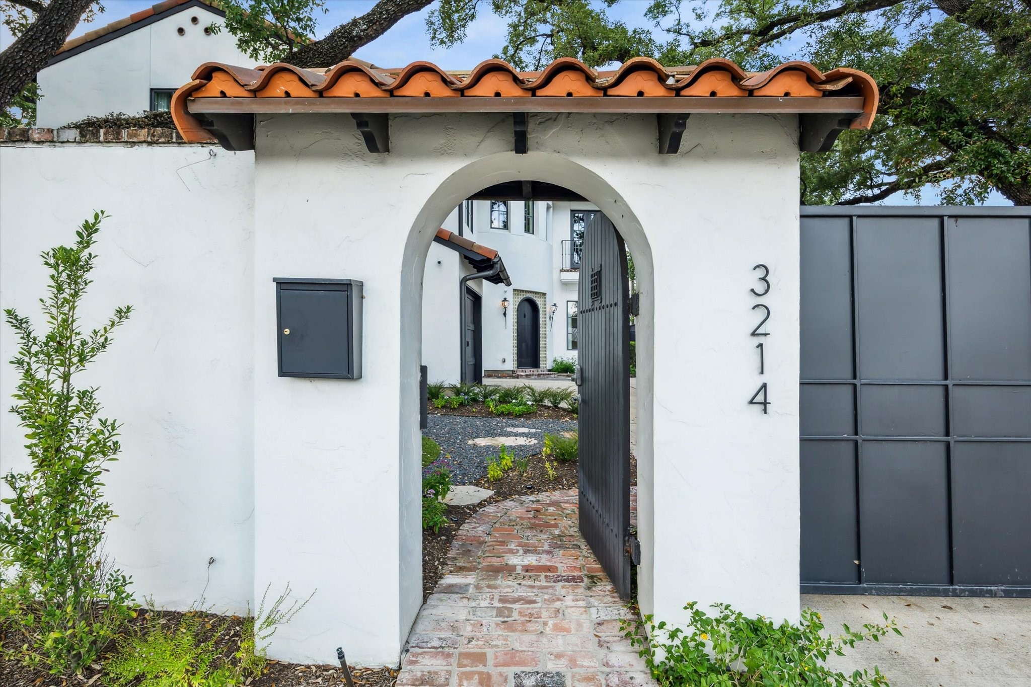 3214 Westheimer Road Houston, TX 77098 - Photo 3 of 34 a view of a blue door with glass windows