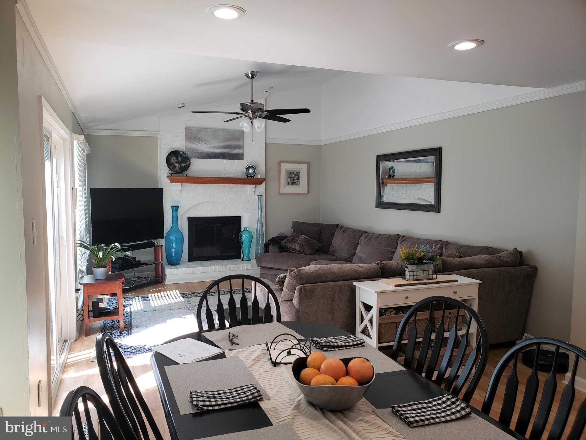 8010 Rocky Run Road Gainesville, VA 20155 - Photo 5 of 13 The family room has a beautiful brick fireplace.