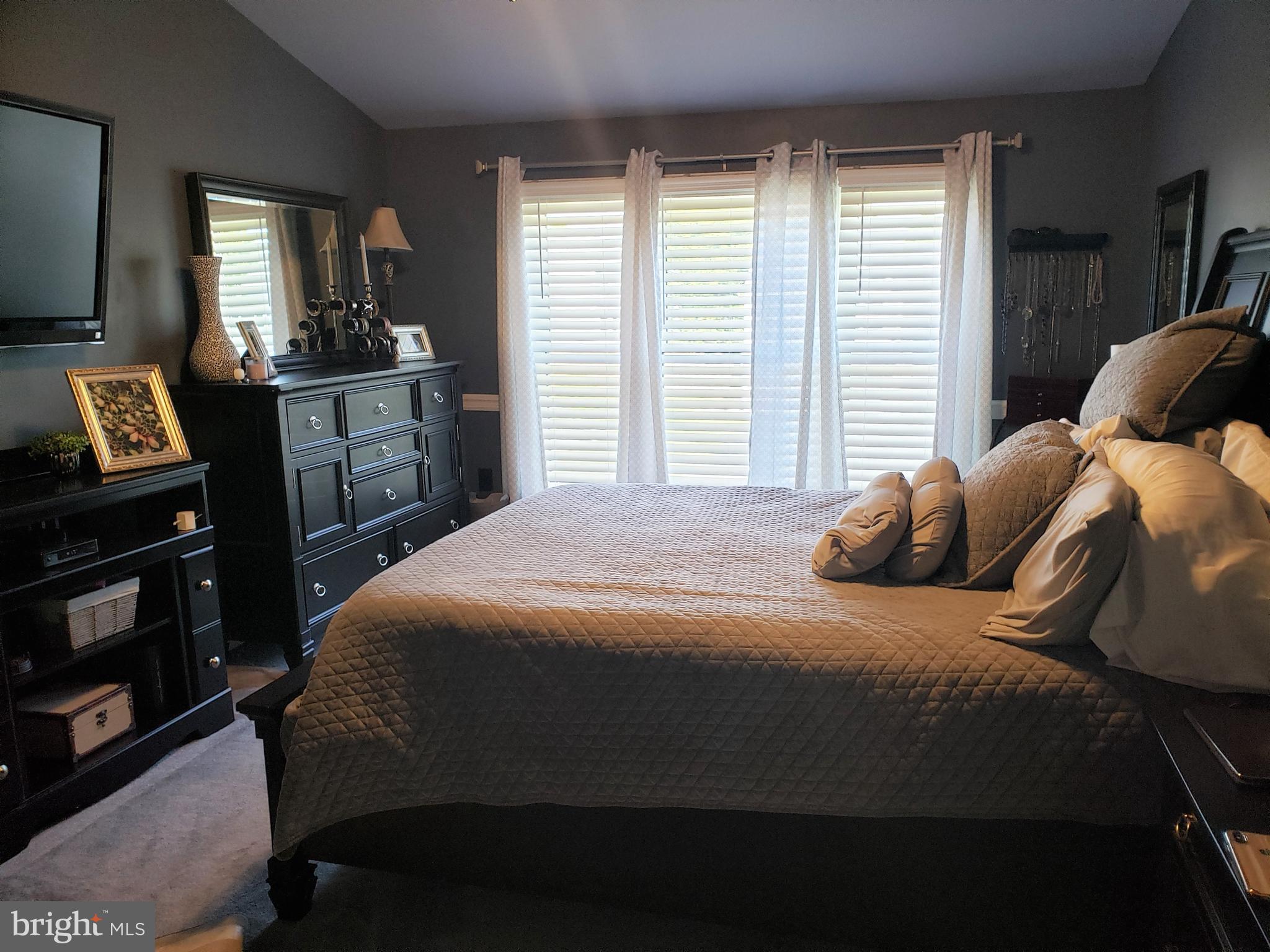 8010 Rocky Run Road Gainesville, VA 20155 - Photo 9 of 13 The master bedroom & bath offer a spa feel.