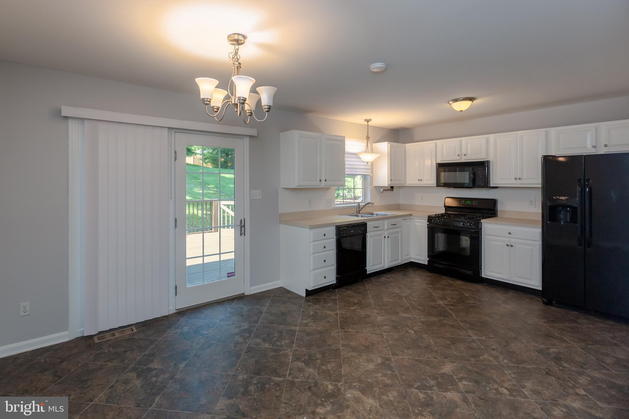 39 Tupelo Street Lititz, PA 17543 - Photo 9 of 27 Dining Area and Kitchen