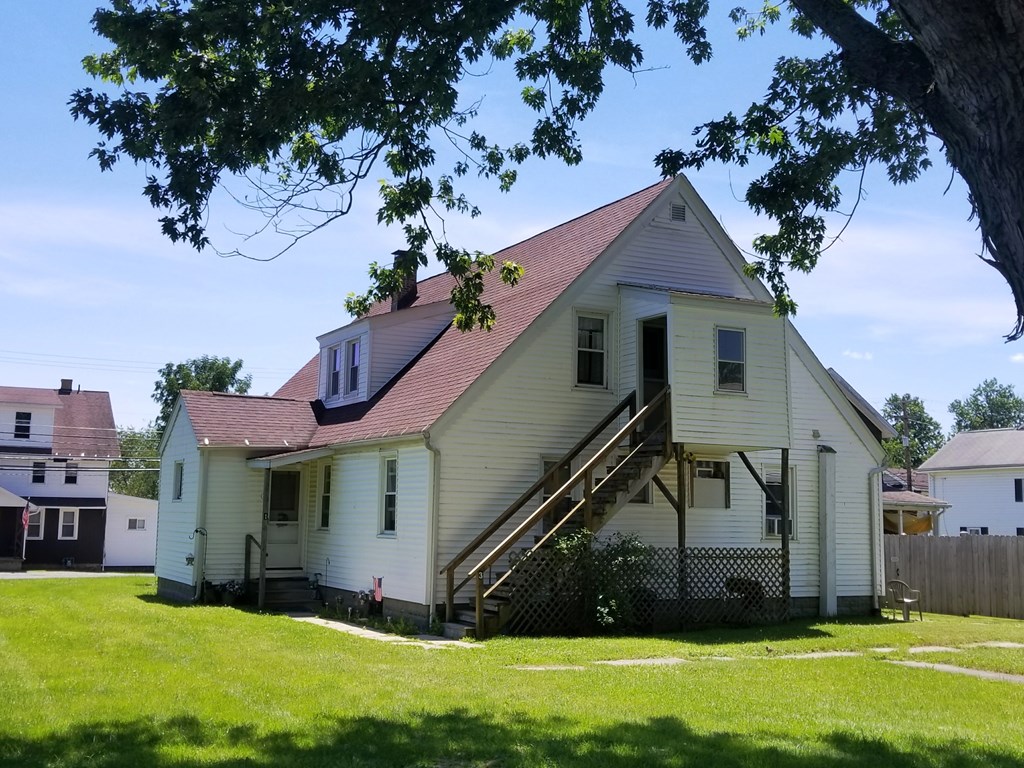 410 Main Street Strattanville, PA 16258 - Photo 4 of 7 a view of a house with a yard