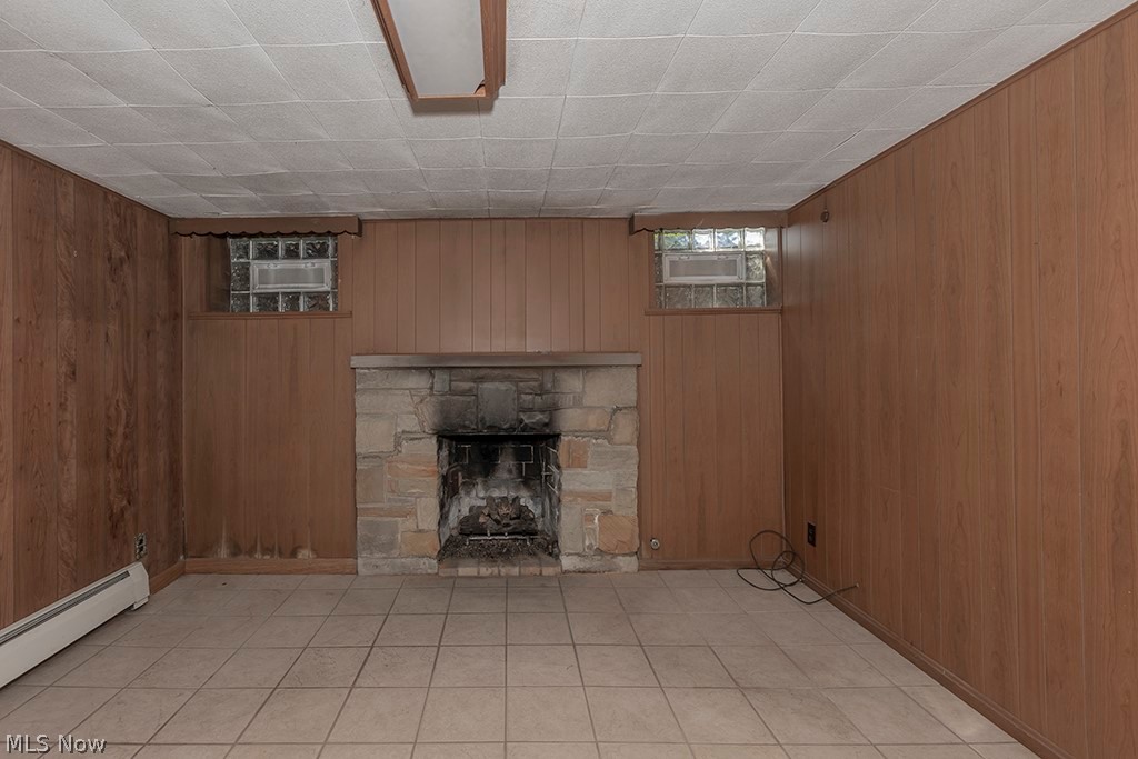 2554 Charney Road Cleveland, OH 44118 - Photo 28 of 34 Fireplace in lower level recreation room.