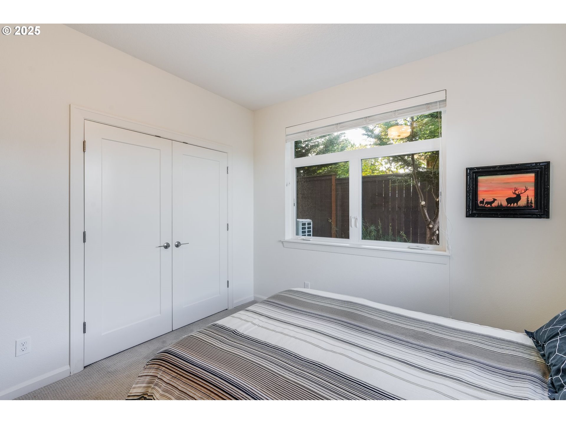 77 Northeast 58th Avenue Portland, OR 97213 - Photo 10 of 36 a view of wooden floor and windows in a room