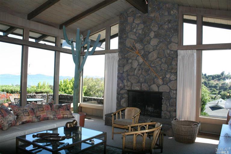 27 Dunfries Terrace San Rafael, CA 94901 - Photo 1 of 1 Formal Living room with Vaulted ceiling and views of Bay and Richmond/San Rafael Bridge