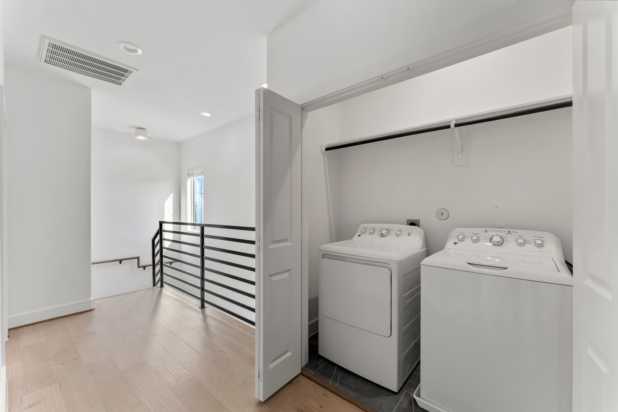 1602 Chestnut Street Houston, TX 77009 - Photo 30 of 49 a view of storage and utility room with washer and dryer