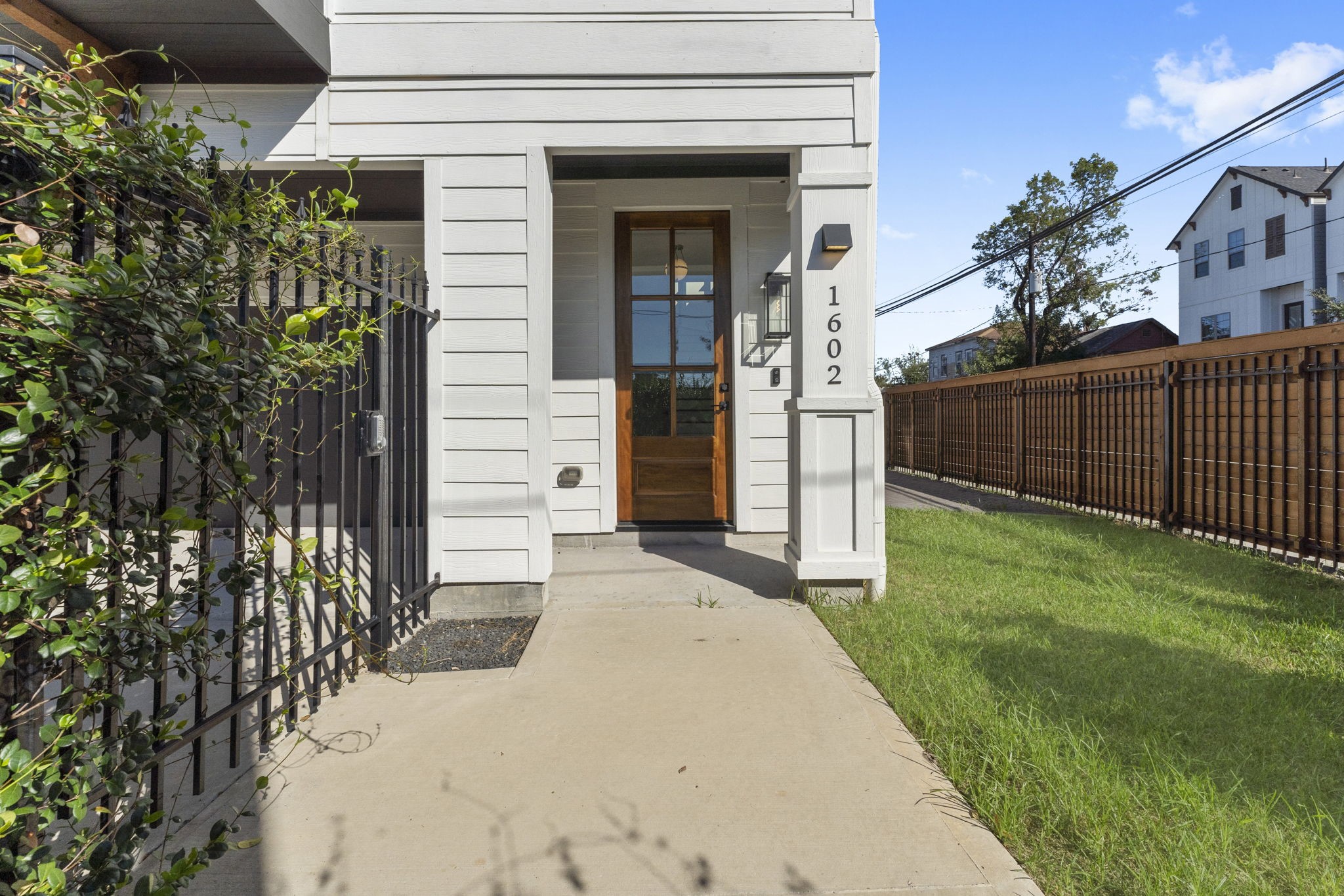 1602 Chestnut Street Houston, TX 77009 - Photo 3 of 49 a view of a house with a small yard and wooden fence