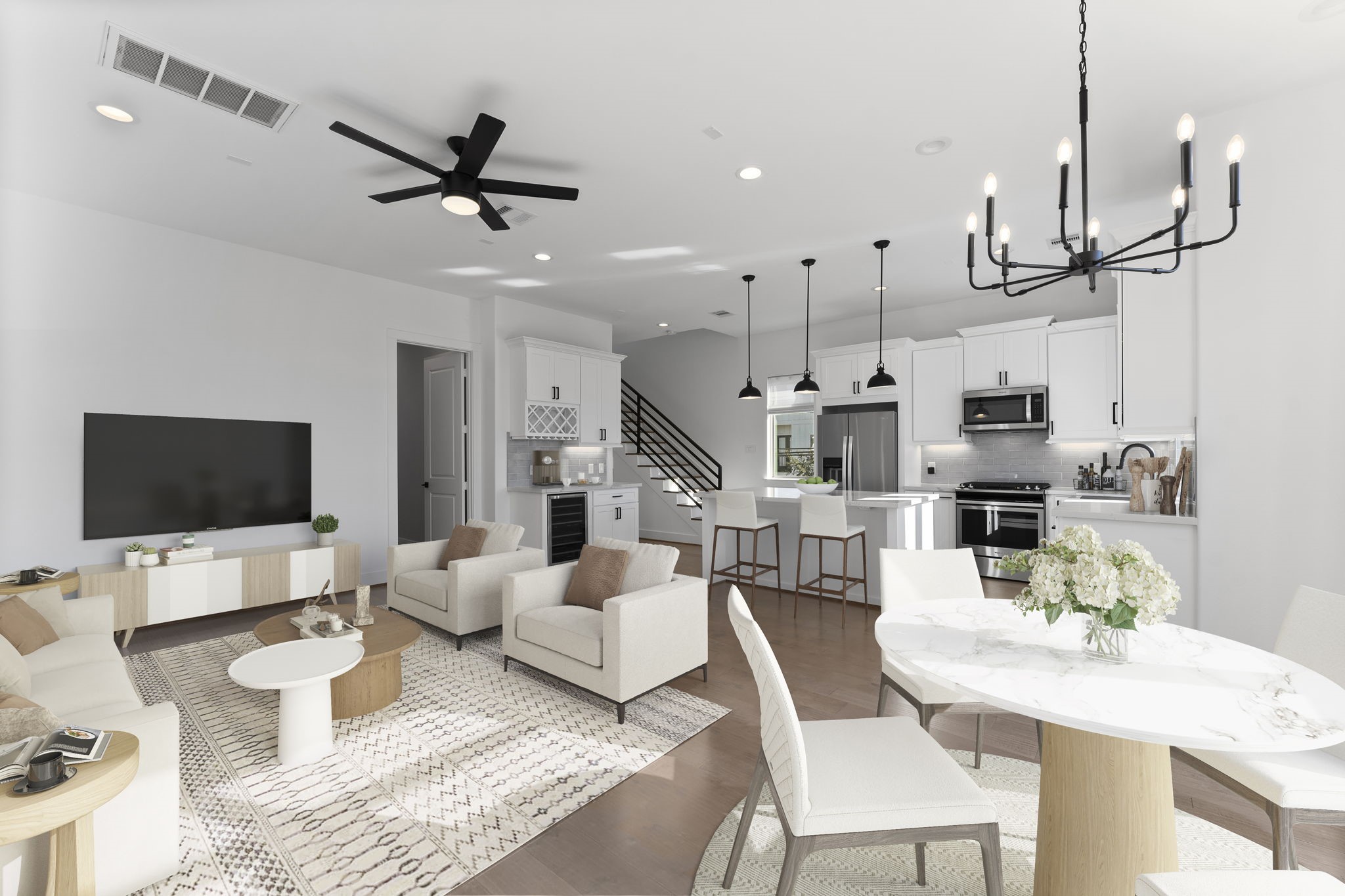 1602 Chestnut Street Houston, TX 77009 - Photo 5 of 49 a living room with furniture kitchen view and a flat screen tv