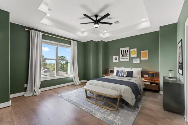 a bathroom with double vanity sinks and a shower