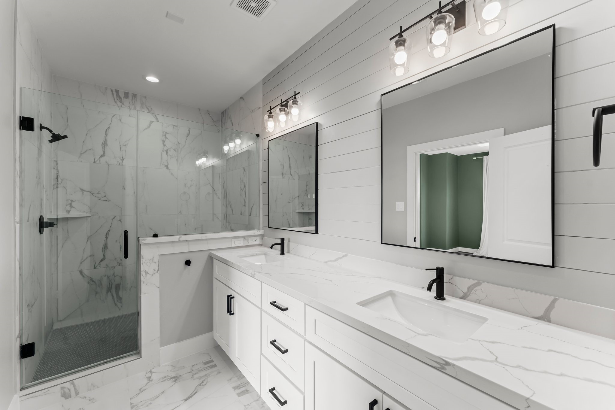 1602 Chestnut Street Houston, TX 77009 - Photo 8 of 49 a bathroom with double vanity sinks and a shower