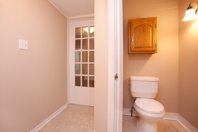 306 Read Street Elburn, IL 60119 - Photo 12 of 18 a bathroom with a toilet and a sink