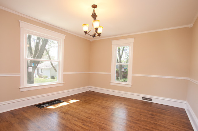 306 Read Street Elburn, IL 60119 - Photo 6 of 18 a view of an empty room with wooden floor and a window