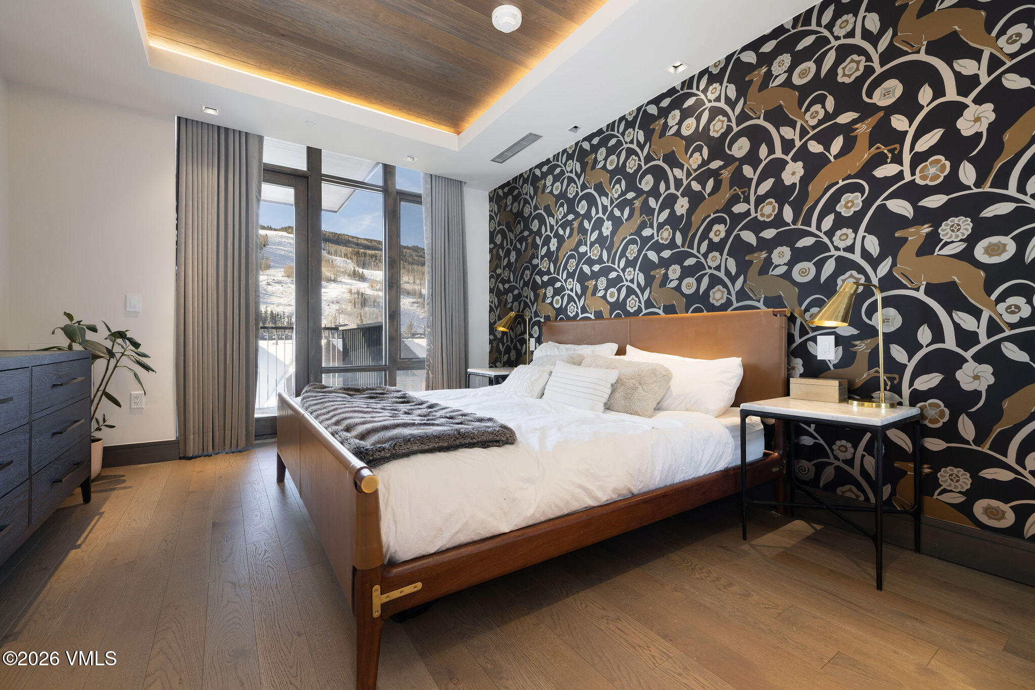 430 South Frontage Road East, Unit RU303 Vail, CO 81657 - Photo 11 of 39 a bed sitting in a bedroom next to a window