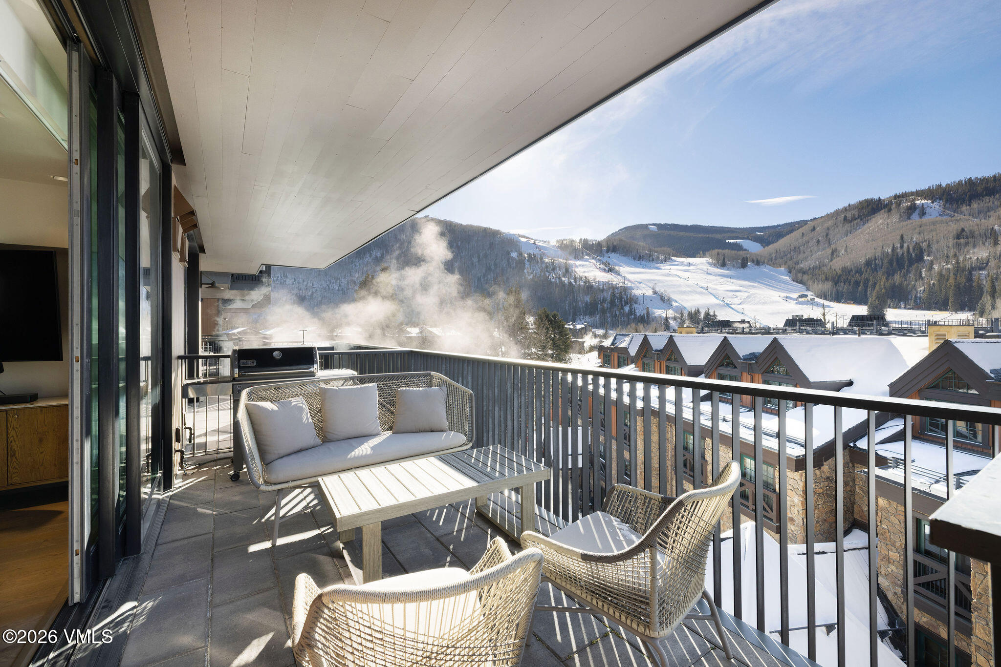 430 South Frontage Road East, Unit RU303 Vail, CO 81657 - Photo 18 of 39 a view of a balcony with furniture