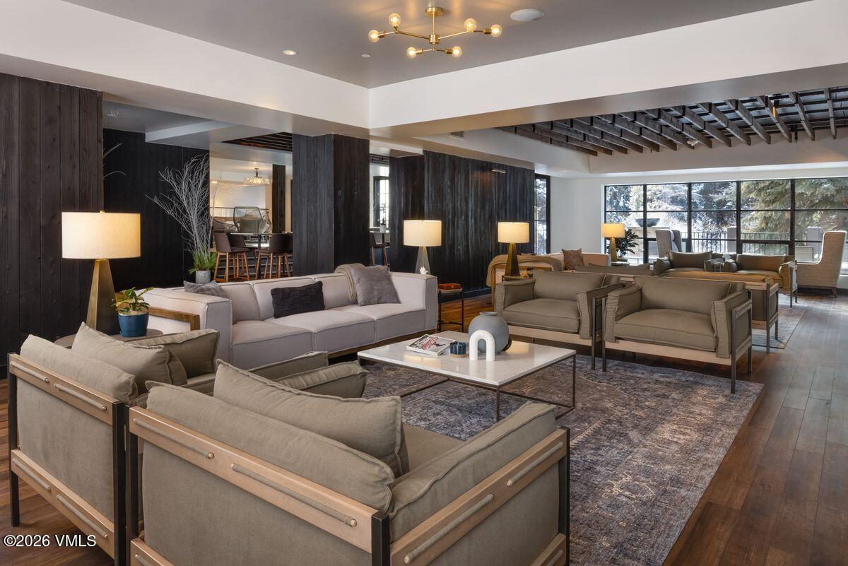 430 South Frontage Road East, Unit RU303 Vail, CO 81657 - Photo 32 of 39 a living room with furniture and a lamp