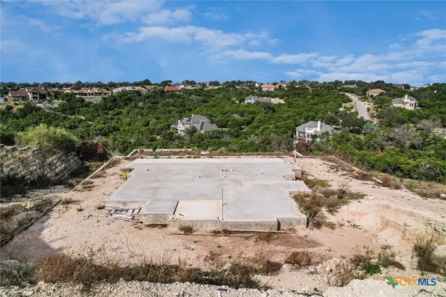 a view of a road with a mountain in the background