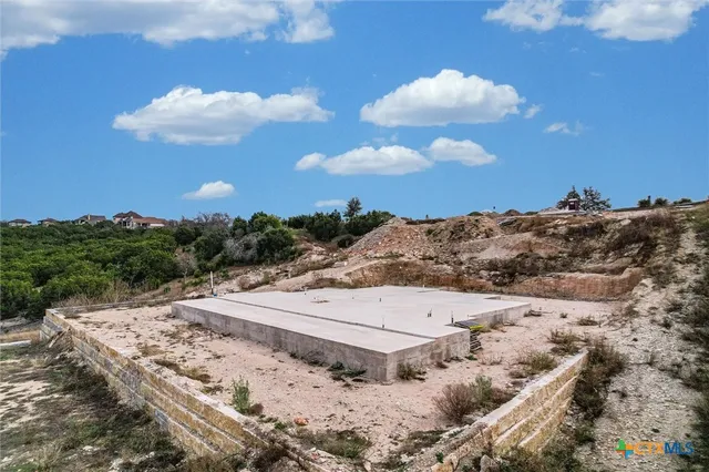 a view of a bunch of trees in a field