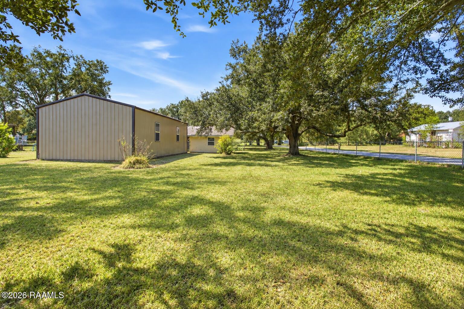 2685 Lloyd Road Maurice, LA 70555 - Photo 19 of 19 Sunlit Rural Yard with Trimmed Grass