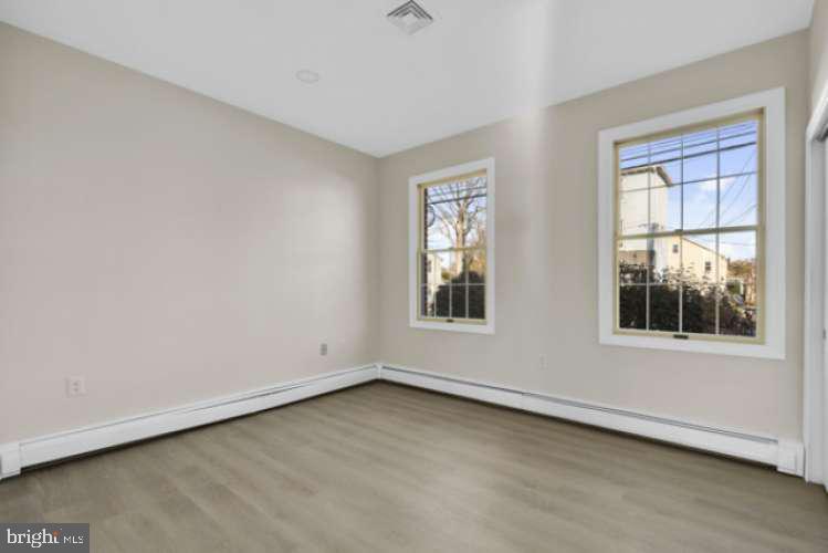 44 Buttonwood Street Mount Holly, NJ 08060 - Photo 18 of 31 an empty room with a window
