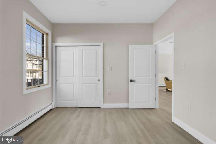 44 Buttonwood Street Mount Holly, NJ 08060 - Photo 19 of 31 a view of an empty room with a window