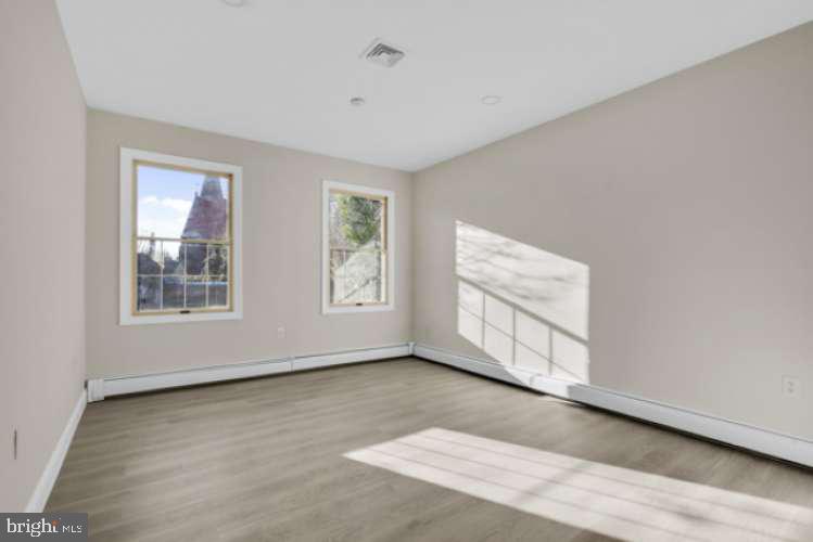 44 Buttonwood Street Mount Holly, NJ 08060 - Photo 21 of 31 an empty room with windows