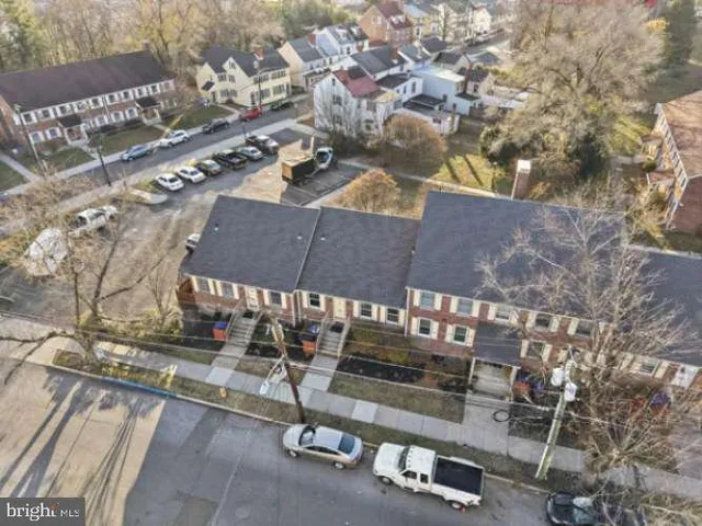 an aerial view of a city with lots of residential buildings