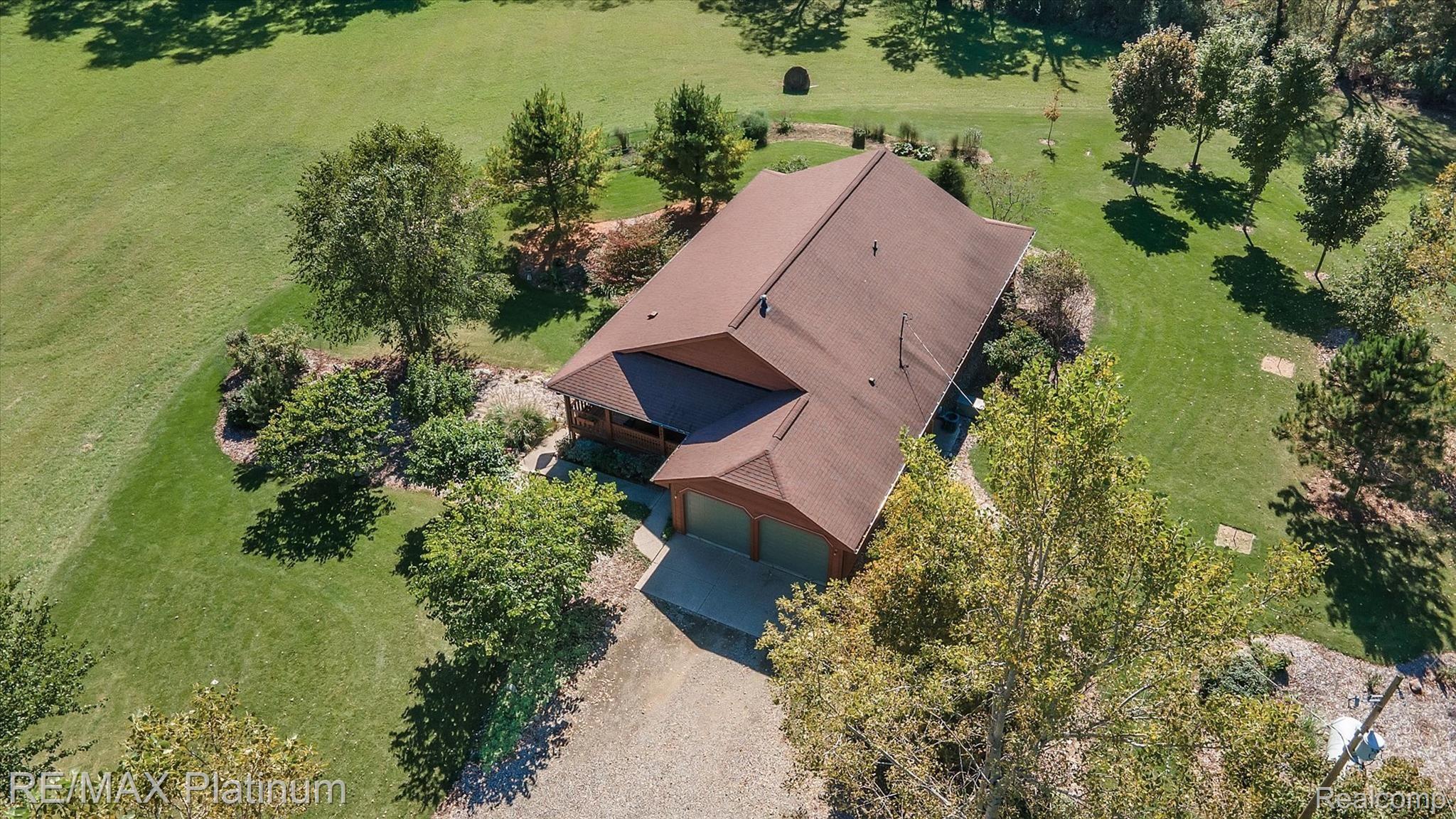 11061 Wiggins Road Howell, MI 48855 - Photo 54 of 79 AERIAL VIEW SHOWS OF WELL PLANNED LANDSCAPING