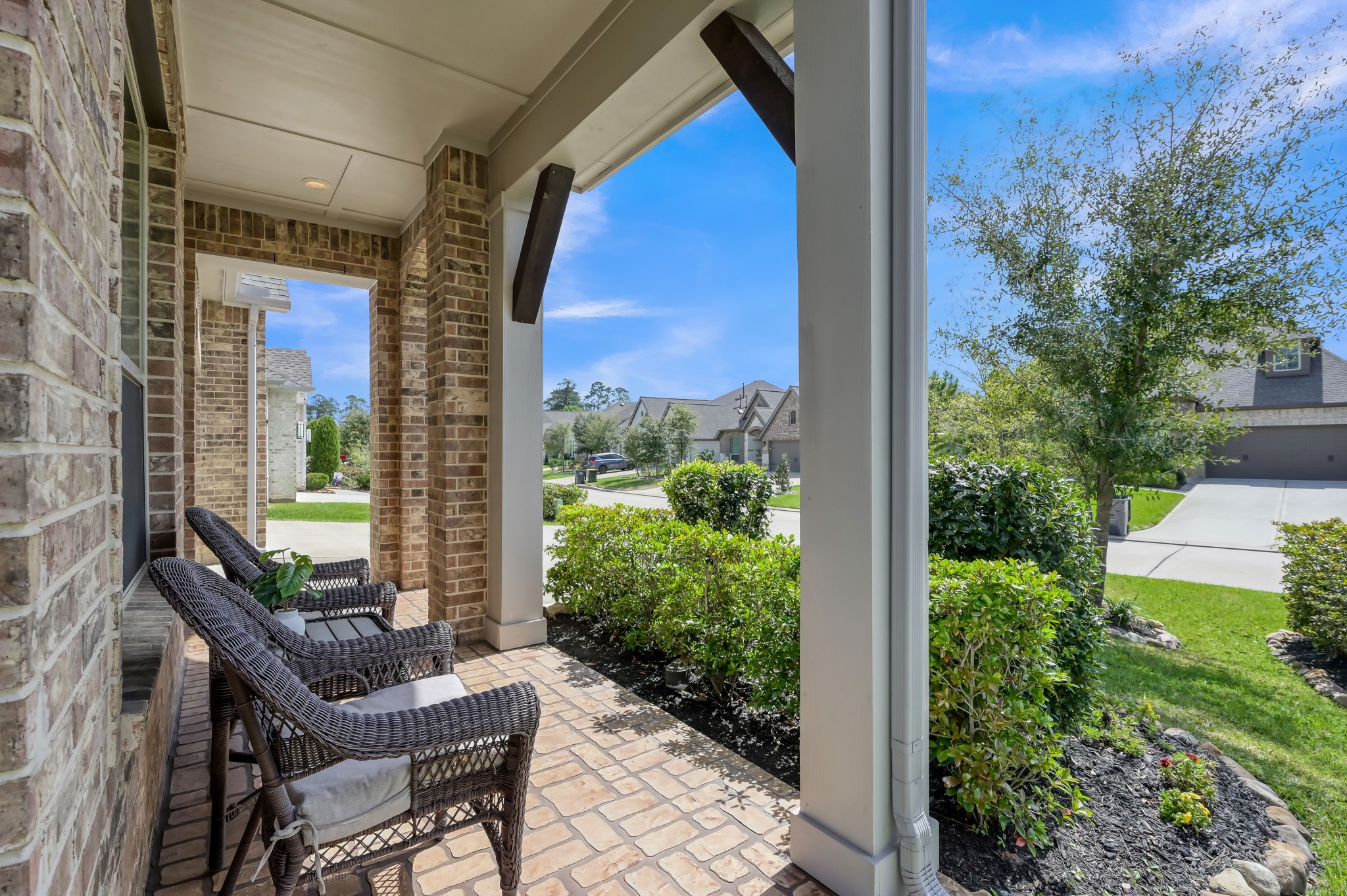 334 Torrey Bloom Loop Conroe, TX 77304 - Photo 5 of 47 Charming covered front porch—perfect for relaxing.