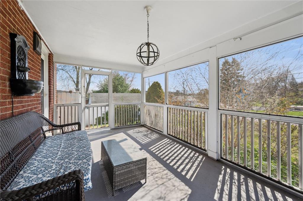 2936 Brodhead Road Aliquippa, PA 15001 - Photo 21 of 47 a view of a porch with wooden floor
