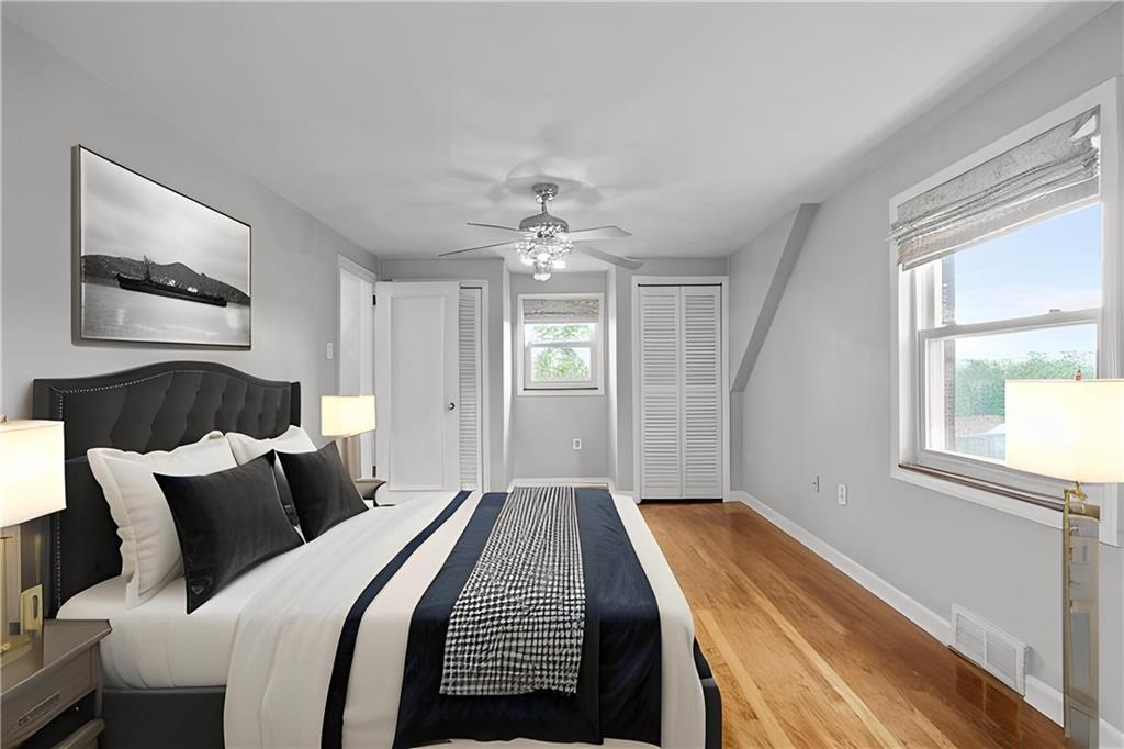 2936 Brodhead Road Aliquippa, PA 15001 - Photo 22 of 47 a bed room with a bed and a chandelier