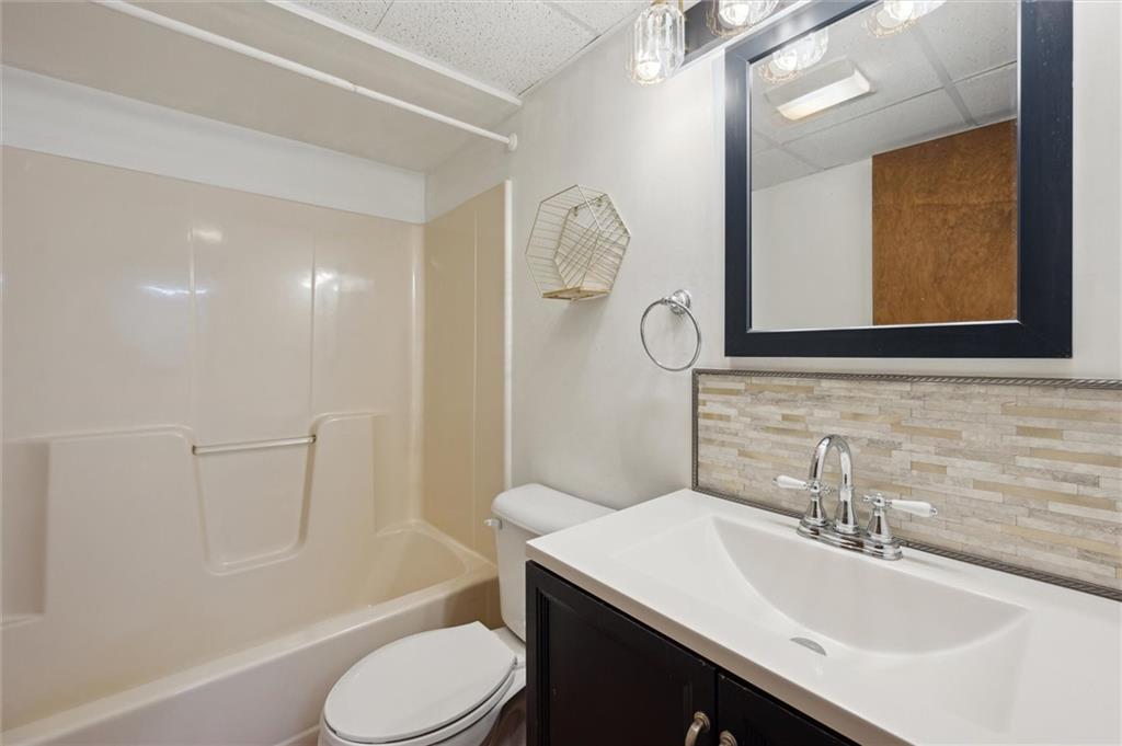 2936 Brodhead Road Aliquippa, PA 15001 - Photo 33 of 47 a bathroom with a sink a toilet and shower
